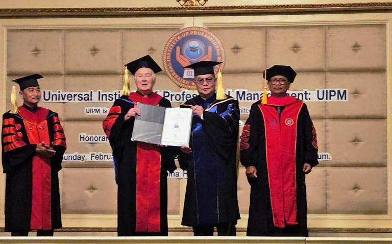 dr Benjamin Kristianto Terima Gelar Doktor PhD di Bangkok Berbasis Pengakuan Global