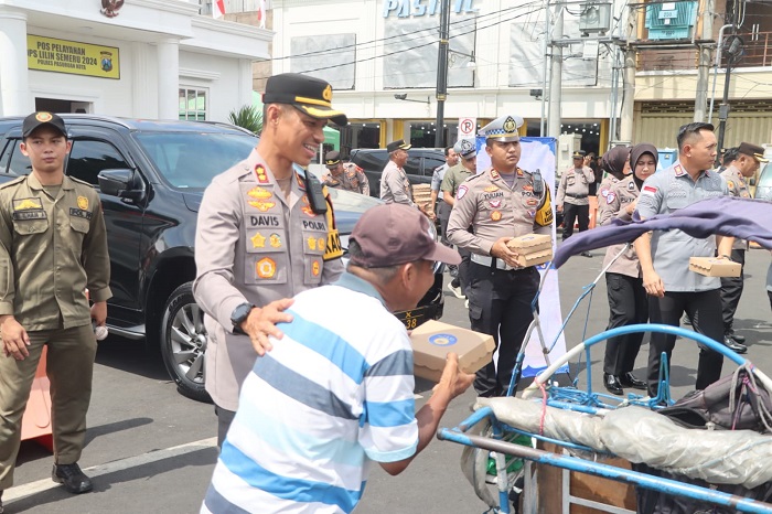 Polres Pasuruan Kota dan Imigrasi Malang Sinergi Berbagi Makanan Bergizi, Dukung Progam Asta Cita Presiden