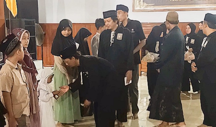 Komisariat Padepokan PSHT Cabang Nganjuk Santuni Anak Yatim dan Galang Bantuan Peduli Bencana Sumatra
