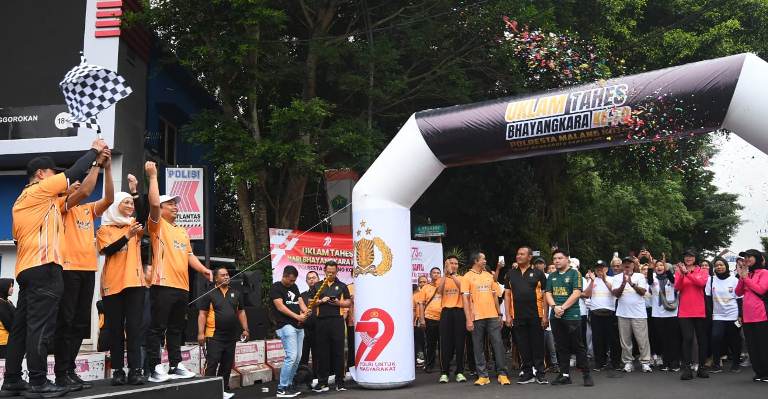 Uklam Tahes Bhayangkara Ke-79: Jalan Sehat yang Menyentuh Hati dan Ekonomi Malang