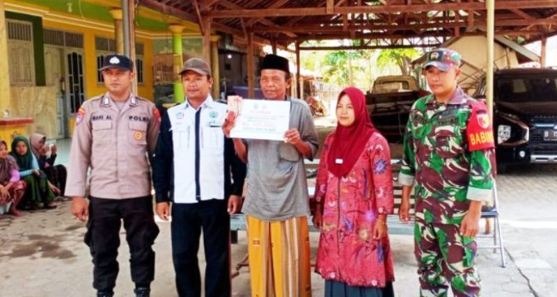 Polsek Tanjung Bumi Kawal Penyaluran  BLT-DD Desa Macajah