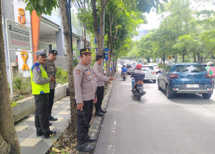 Komunitas Falun Gong Gelar Meditasi Damai di Mayjend Sungkono, Polsek Sawahan Pastikan Keamanan Lokasi