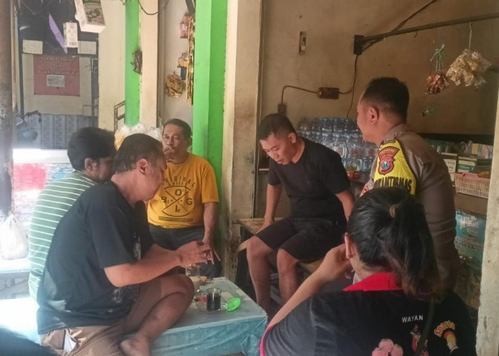 Dekati Warga di Warkop, Polsek Wiyung Masifkan Sosialisasi Layanan Darurat Call Center 110