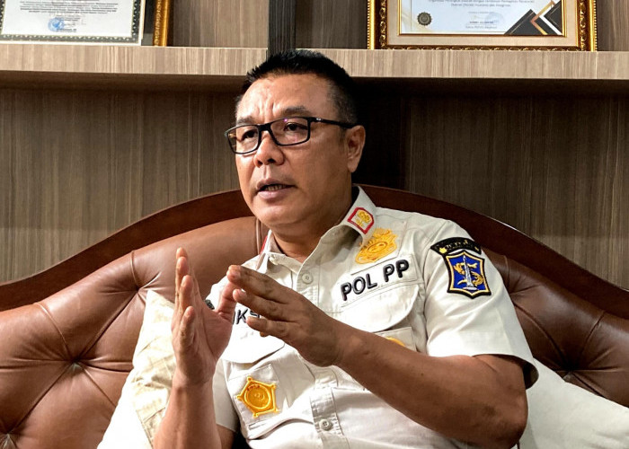 Anggota Satpol PP Surabaya Dipecat Karena Penipuan Modus Investasi