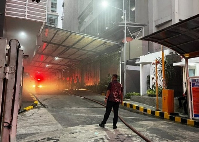 Mobil Listrik Terbakar di Basement Apartemen Trillium Surabaya, Asap Tebal Picu Kepanikan