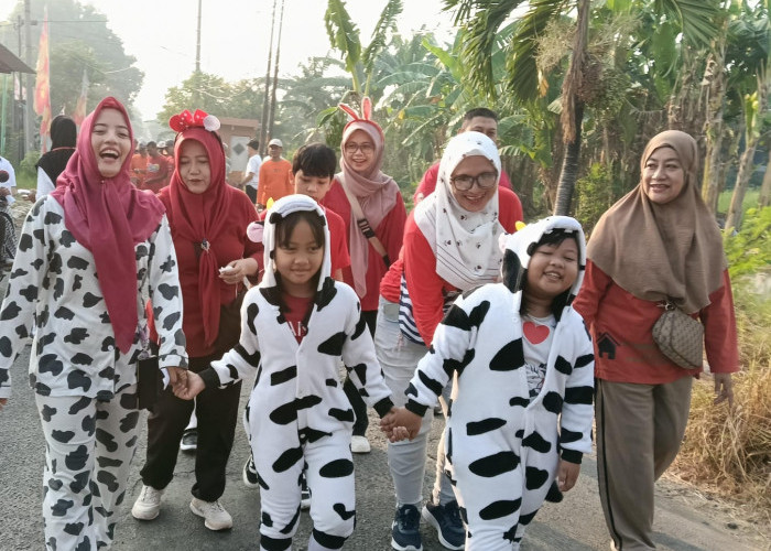 Semarak HUT Ke-81 RI, Warga RW 13 Kebraon Indah Permai Gelar Jalan Sehat dan Dorong Potensi UMKM