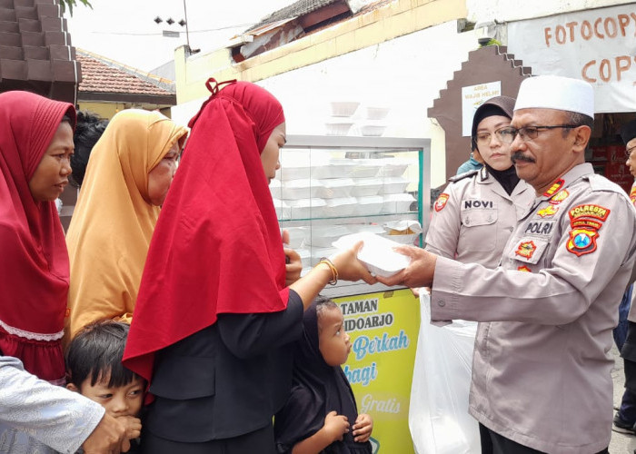 Jumat Berkah, Polsek Taman Bagikan Makanan Gratis 