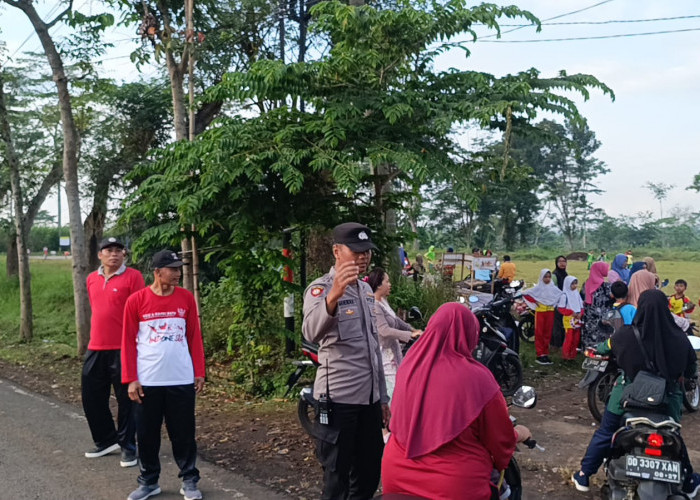 Polsek Padang Amankan Jalan Sehat KKG Guslah HUT Ke-80 RI di Desa Bodang