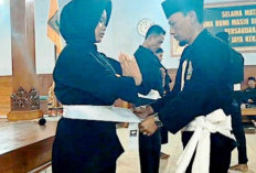 Komisariat Padepokan PSHT Cabang Nganjuk Gelar Penyerahan Sabuk Putih dan Santunan