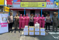 Beri Dukungan Moril, Ketua Bhayangkari Ranting Simokerto Kunjungi Pos Pam Nataru Gembong