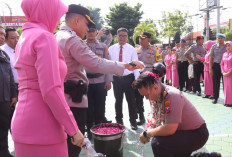 Polresta Banyuwangi Gelar Upacara Kenaikan Pangkat 109 Personel dan Pelepasan Purna Bhakti