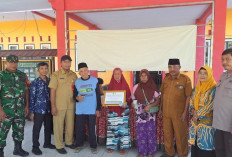 Polsek Jatiroto Dampingi Penyaluran BLT DD dan Ajak Warga Dukung Ketahanan Pangan